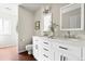 Bright bathroom featuring double vanity with modern fixtures and a stylish design at 845 S Kenton St, Aurora, CO 80012