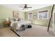 Inviting bedroom with a comfortable bed, windows, and plenty of natural light at 845 S Kenton St, Aurora, CO 80012