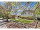 Charming two-story home featuring a lush lawn and mature trees, offering great curb appeal at 845 S Kenton St, Aurora, CO 80012