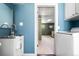Basement laundry with basin sink, new toilet, walk-in shower, washer, and dryer at 845 S Kenton St, Aurora, CO 80012