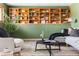 Comfortable living room with stylish furnishings, shelving, and a cozy atmosphere at 845 S Kenton St, Aurora, CO 80012