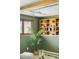 Modern living room featuring wood-trimmed shelving with stylish decorations at 845 S Kenton St, Aurora, CO 80012