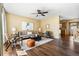 Bright living room with modern decor, hardwood floors, and an open layout at 845 S Kenton St, Aurora, CO 80012