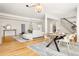 Bright and airy living room with modern furnishings and hardwood floors at 1 Random Rd, Englewood, CO 80113