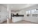 Bright, white kitchen with stainless steel appliances, and modern backsplash at 691 N Tempe St, Aurora, CO 80018