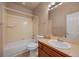 Bathroom featuring a tub/shower combo and a sink with a vanity at 9040 Grand Mesa Ave, Longmont, CO 80504