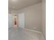 Bedroom with neutral colored walls, carpeted floor and access to the ensuite bathroom at 9040 Grand Mesa Ave, Longmont, CO 80504