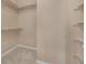 Walk-in closet with carpeted floor and built-in shelving for storage at 9040 Grand Mesa Ave, Longmont, CO 80504