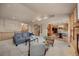 Open-concept living room connecting to the dining and kitchen areas, perfect for modern living at 9040 Grand Mesa Ave, Longmont, CO 80504
