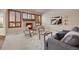Comfortable living room featuring a fireplace, stylish decor, and plenty of natural light at 9040 Grand Mesa Ave, Longmont, CO 80504