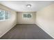 Bright, spacious bedroom with plush carpet, ample natural light, and neutral paint at 13235 Rigel Dr, Lone Tree, CO 80124