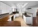 Modern kitchen with stainless steel appliances, wooden countertops, and tile backsplash at 13235 Rigel Dr, Lone Tree, CO 80124