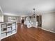 Spacious living room featuring hardwood floors, neutral colors, and abundant natural light at 13235 Rigel Dr, Lone Tree, CO 80124