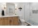 Stylish bathroom featuring a glass-enclosed shower, modern vanity, and elegant fixtures at 2840 S Bannock St, Englewood, CO 80110