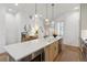 Bright kitchen with a center island, stylish pendant lighting, and modern fixtures at 2840 S Bannock St, Englewood, CO 80110