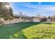 Classic single-story home with a spacious front yard and a convenient attached two-car garage at 772 Urban Ct, Lakewood, CO 80401