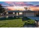 Charming single-story brick home with a well-manicured lawn and a two-car garage at 772 Urban Ct, Lakewood, CO 80401