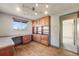 Bright office with custom built-ins, ample storage, and a well-lit workspace at 772 Urban Ct, Lakewood, CO 80401
