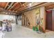 Unfinished basement with laundry hookups and storage at 1557 S Owens St # 59, Denver, CO 80232