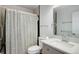 Clean bathroom with white marble sink, shower and neutral tones at 12430 E Pacific Cir # B, Aurora, CO 80014
