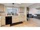Bright kitchen with granite countertops and view to the living room at 12430 E Pacific Cir # B, Aurora, CO 80014