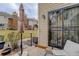 Patio with seating and view of the lawn and neighboring townhomes at 12430 E Pacific Cir # B, Aurora, CO 80014