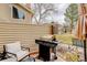 Outdoor patio with gas grill and comfortable chairs at 12430 E Pacific Cir # B, Aurora, CO 80014