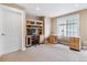 Bright home office with custom built-in desk and storage, perfect for remote work or study at 1160 S Sherman St, Denver, CO 80210