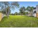 Lush backyard with expansive green space and mature trees at 2101 Champlain Dr, Boulder, CO 80301