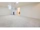 Spacious finished basement with carpet, a wet bar, and natural light at 2101 Champlain Dr, Boulder, CO 80301