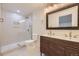 Stylish bathroom with a glass shower, modern vanity, and elegant fixtures at 2101 Champlain Dr, Boulder, CO 80301