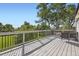 Outdoor deck offering scenic views, a sitting area, and natural light at 2101 Champlain Dr, Boulder, CO 80301