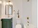 Stylish bathroom features a modern vanity, classic fixtures, and a tiled shower with tub at 21472 E 46Th Ave, Denver, CO 80249