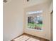 Bright bedroom features a large window offering abundant natural light and neighborhood views at 21472 E 46Th Ave, Denver, CO 80249