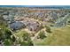 Breathtaking aerial perspective of a vibrant neighborhood with well-kept homes, landscaping, and community spaces at 282 N De Gaulle St, Aurora, CO 80018
