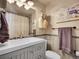 Well-lit bathroom featuring a modern vanity and decor at 3817 Ponderosa Dr, Evergreen, CO 80439