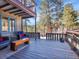 Inviting outdoor deck area with comfortable seating perfect for relaxing and enjoying nature at 3817 Ponderosa Dr, Evergreen, CO 80439