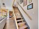 Inviting staircase showcasing wood treads and modern design at 3817 Ponderosa Dr, Evergreen, CO 80439