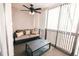 Inviting covered balcony with a sofa and table at 3460 S Poplar St # 204, Denver, CO 80224