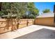 A spacious and private backyard with a stamped concrete patio and fenced yard, perfect for outdoor enjoyment at 136 S Eagle Cir, Aurora, CO 80012