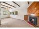 The living room has a brick fireplace and windows, with natural light at 136 S Eagle Cir, Aurora, CO 80012