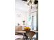 Bright kitchen with stainless steel appliances, stylish light fixtures, and modern countertops at 10000 E Ohio Ave, Denver, CO 80247