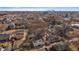 Aerial view showing the neighborhood and the downtown skyline in the distance at 3947 Winona Ct, Denver, CO 80212