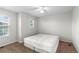 Bedroom featuring a double window and a ceiling fan at 9453 Lark Sparrow Dr, Highlands Ranch, CO 80126