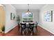 Charming dining room features a large window and stylish decor at 9453 Lark Sparrow Dr, Highlands Ranch, CO 80126