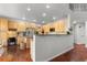 Well-lit kitchen boasts ample cabinet space and stainless steel appliances at 9453 Lark Sparrow Dr, Highlands Ranch, CO 80126