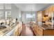 Well-equipped kitchen with a view of the backyard and breakfast table at 9453 Lark Sparrow Dr, Highlands Ranch, CO 80126