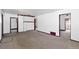 The Living Room offers ample space and multiple doorways, providing potential for flexible living arrangements at 6025 S Sycamore St, Littleton, CO 80120
