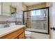 Tiled bathroom featuring a bathtub and vanity with sink at 1881 E 95Th Ave, Thornton, CO 80229