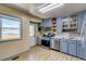 Modern kitchen with stainless steel appliances, updated cabinetry, and a bright window at 1881 E 95Th Ave, Thornton, CO 80229